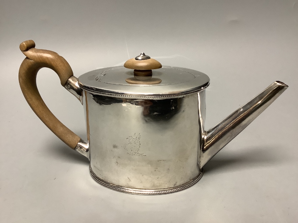 A George III silver oval teapot, with engraved armorial, Emes & Barnard, London, 1810 (a.f.).